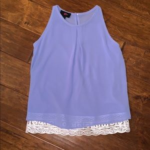 Periwinkle sleeveless top with lace lining.